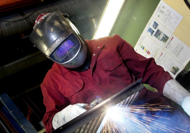 ROTO employee welding